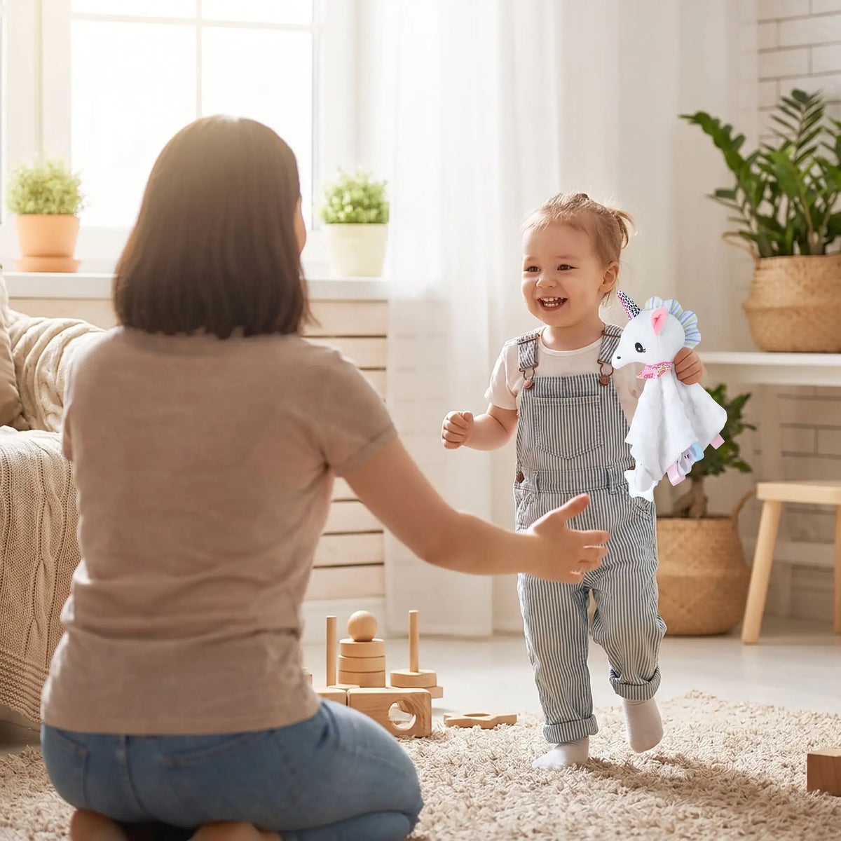 Doudou bébé avec maman