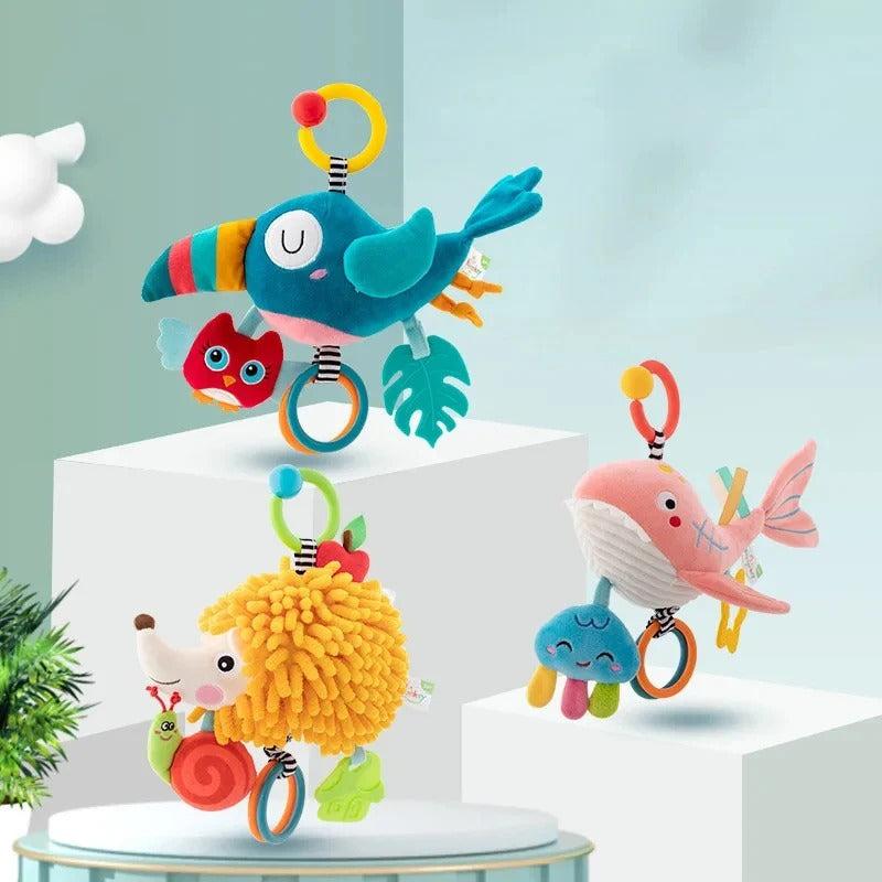 Doudou-peluche-hochet-anneaux-velours-doux-bébé