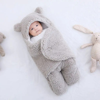 nid-d-ange-Ours-polaire-gris-bébé-au-chaud