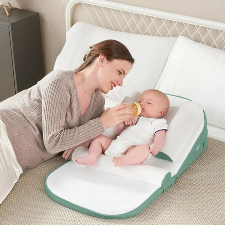 Réducteur de lit anti reflux bébé mange