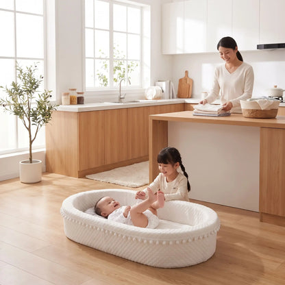 Réducteur de lit bébé au salon