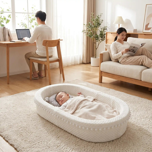 Réducteur de lit bébé dort et les parents travaillent
