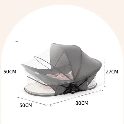 Réducteur de lit bébé gris