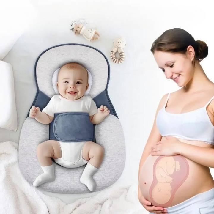 Réducteur de lit bébé allongé