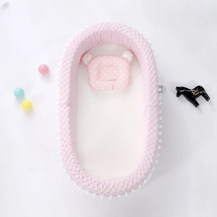 Réducteur de lit rose