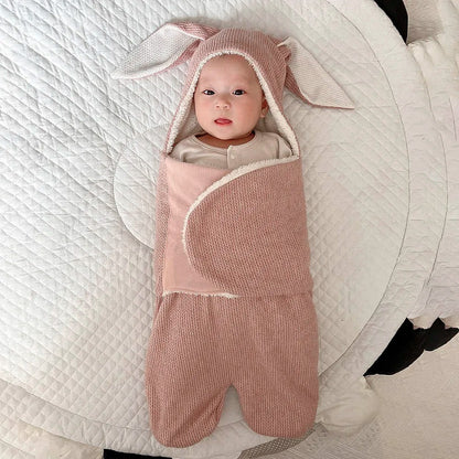 nid-d-ange-Lapin-rose-pieds-bébé-au-chaud
