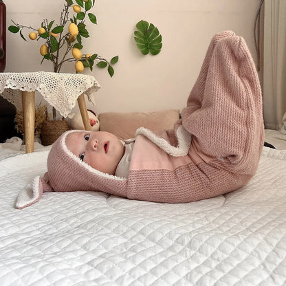 nid-d-ange-Lapin-rose-bébé-au-chaud